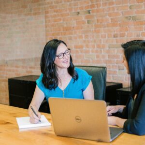 two women in an office negotiating