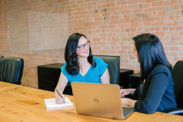 two women in an office negotiating