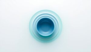 Abstract illustration of blue and green sound waves rippling out from a glowing circle, representing the resonance of your own voice in sound healing.
